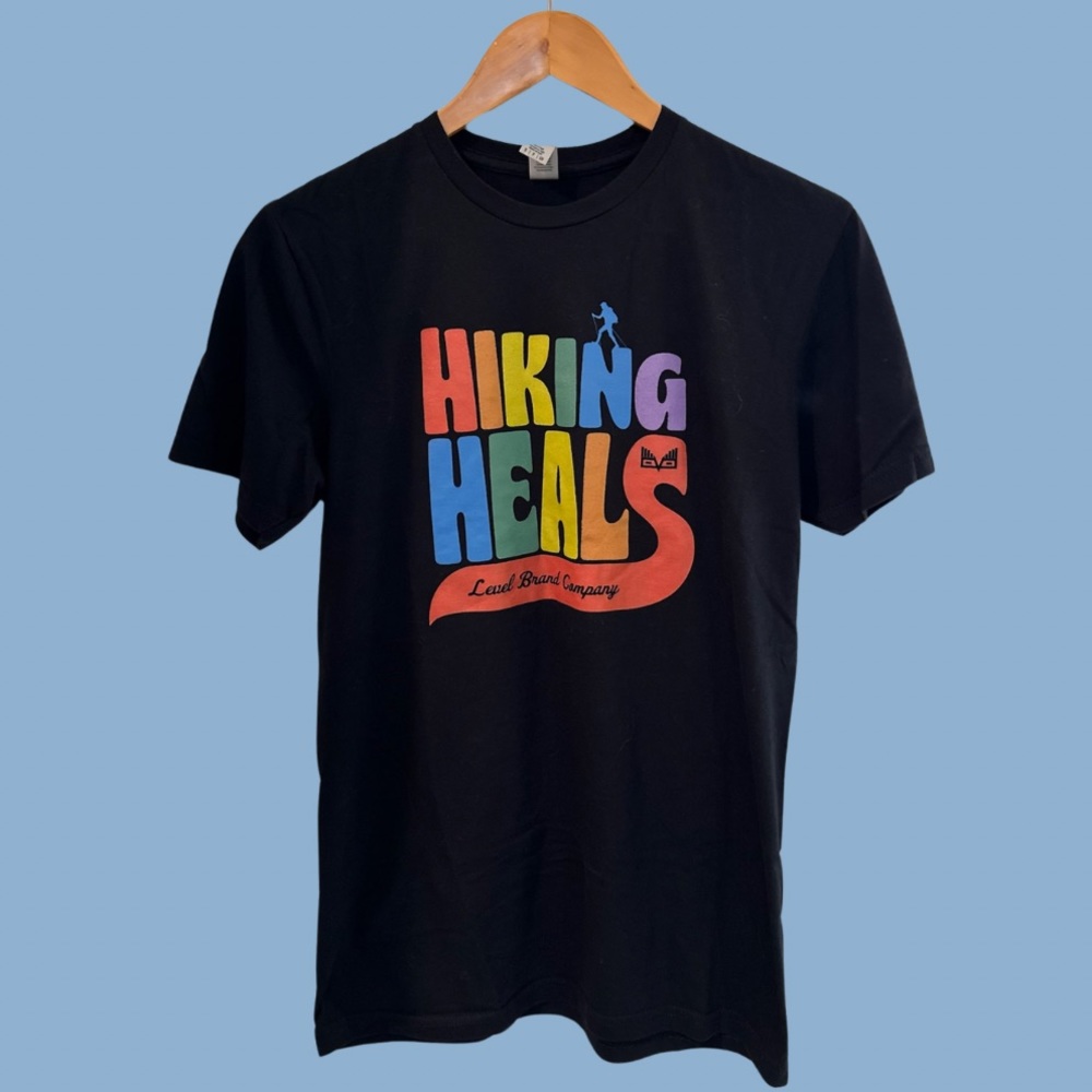 Rainbow “Hiking Heals” Graphic T-shirt, Unisex Size Small.
